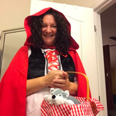 A customer dressed in a Little Red Riding hood costume.